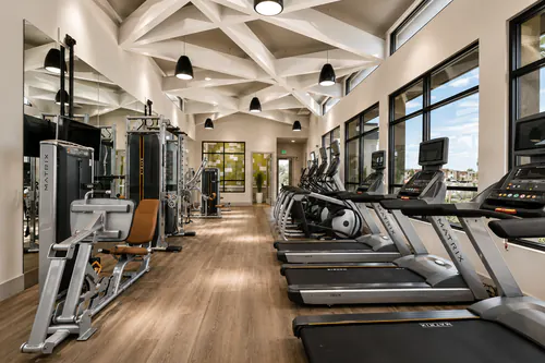 Weight training area in the fitness center at The Mayfair Apartments